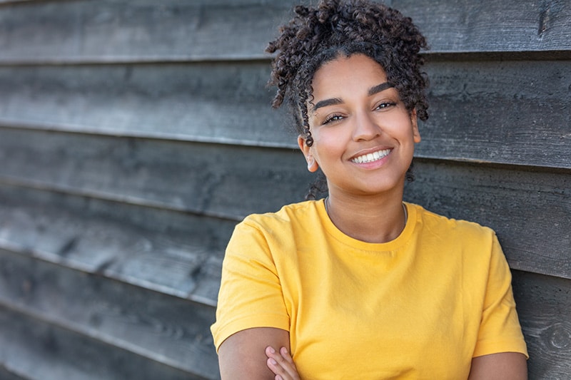 Teen girl smiling homepage early orthodontics photo | Advanced Orthodontics in Burien, WA