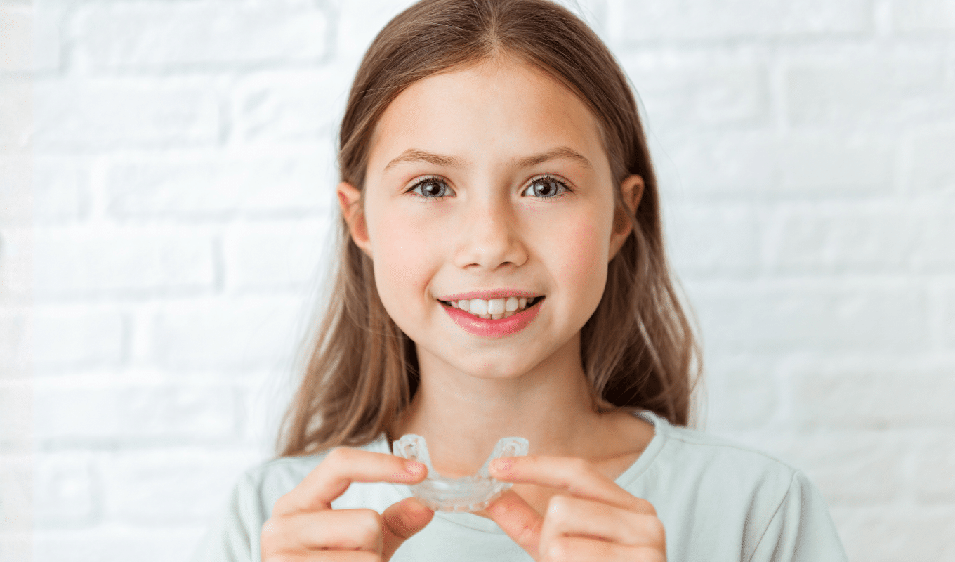 Young girl smiling Invisalign first page photo | Advanced Orthodontics in Burien, WA