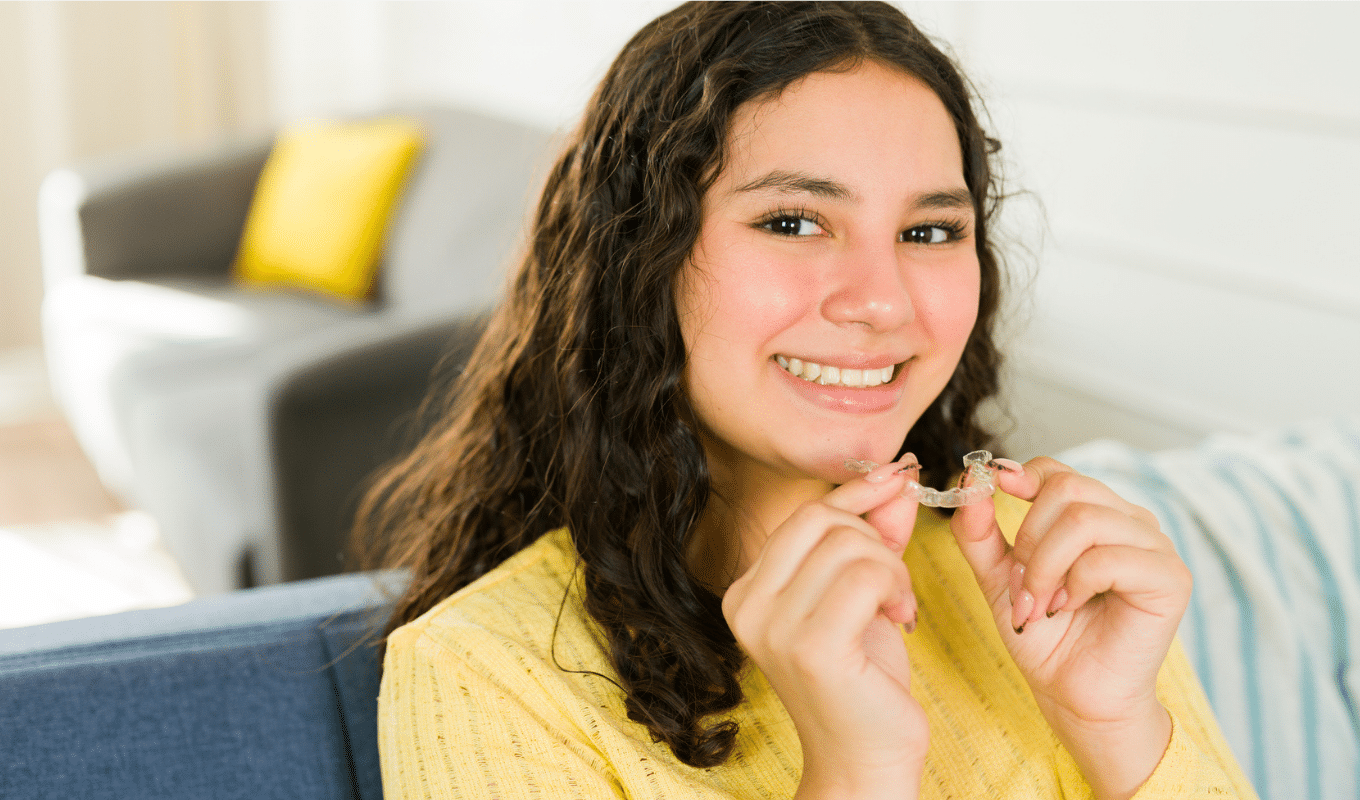 Teen girl smiling Invisalign teen page photo | Advanced Orthodontics in Burien, WA